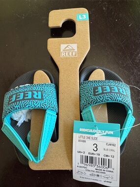 NWT: Reef Kids Slide Sandals in Blue Coral and Black